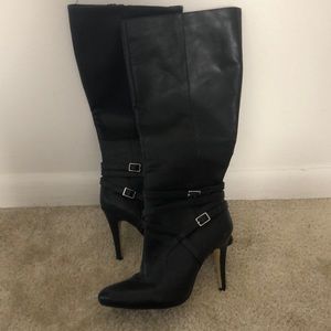 Black tall heeled boots